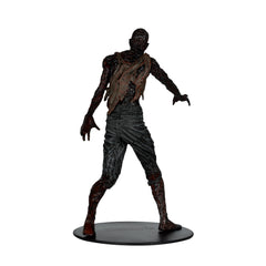 McFarlane Toys Walking Dead screwdriver accessory near eye area for action pose