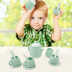 MCGMITT silicone tea set in a play kitchen scene, durable and easy to clean.