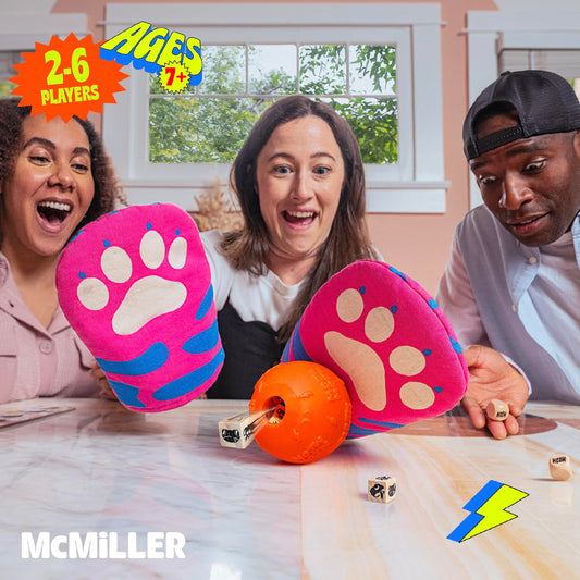 MCMILLER ENTERTAINMENT Cat Mitt Game dice and mitts on the table invite quick fun