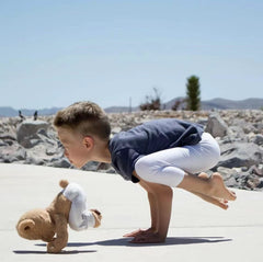Meddy Teddy Mommy-Daddy and Me yoga, wholesome bonding during exercise.