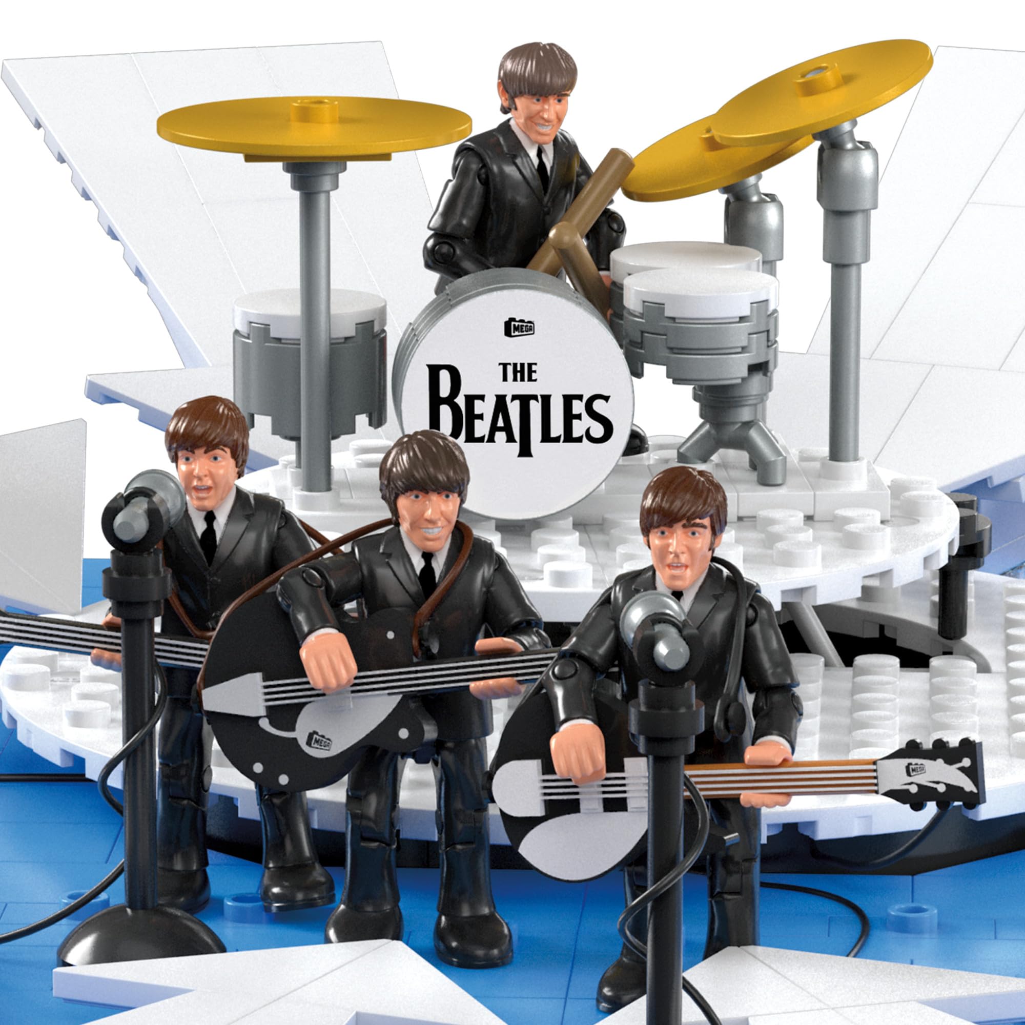 Mega Brands Beatles Fab Four figures with articulated joints for expressive poses.