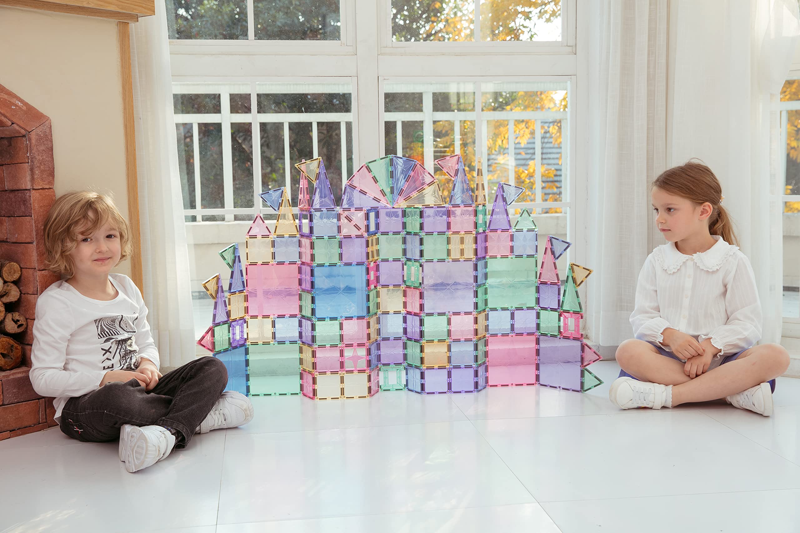 MEGAGONTILES star-shaped refractions create dazzling visuals when sunlight hits the tiles.