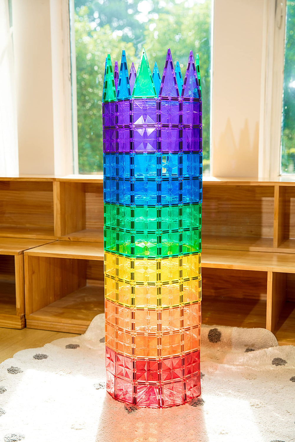 MEGAGONTILES wheel bases enable dynamic builds and rolling experiments in playtime.