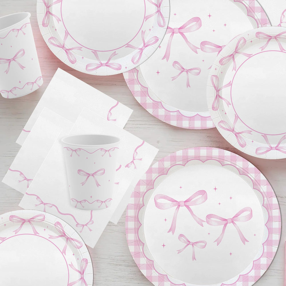 MEHOFOND pink bow plates cups and napkins for easy, stylish cleanup.