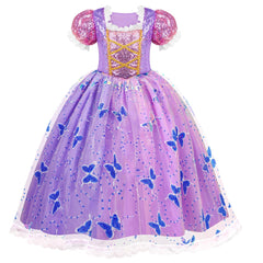 Child wearing Meland dress at a party shows sparkling, festive style.