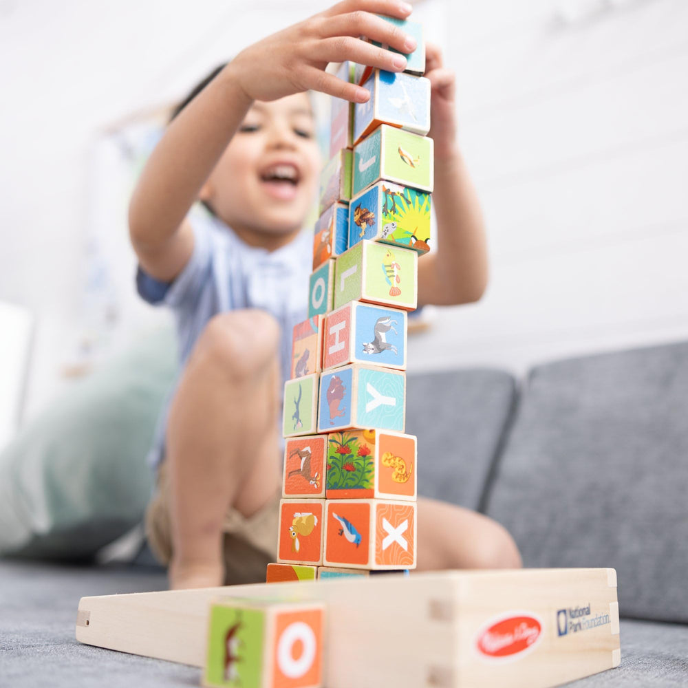 Melissa & Doug Arches puzzle blocks promote problem solving through building.