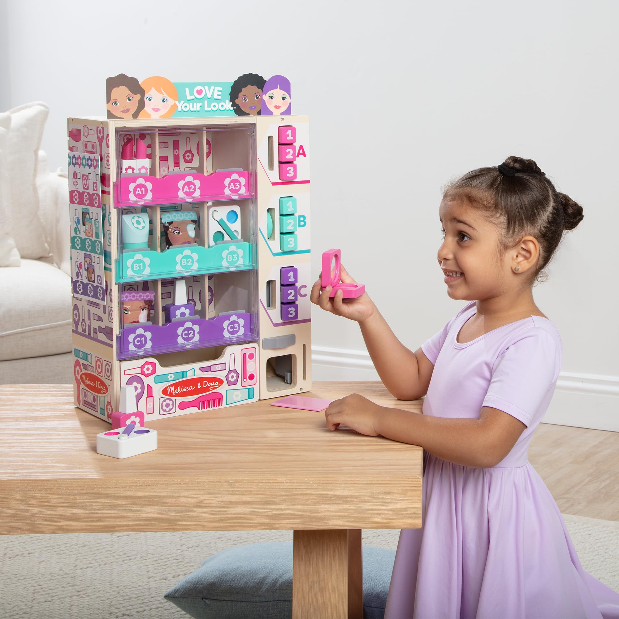 Melissa & Doug back of kiosk open for stocking showing easy restock benefit