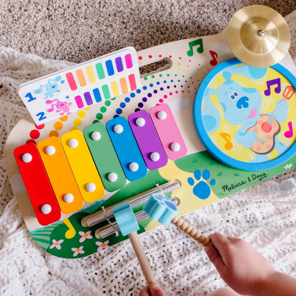 Melissa & Doug Blue's Clues & You wooden music board chimes close-up supports auditory development