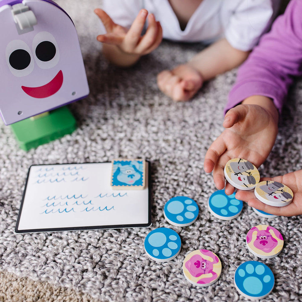 Envelope and invitations from Melissa and Doug Blue's Clues set for interactive mail adventures