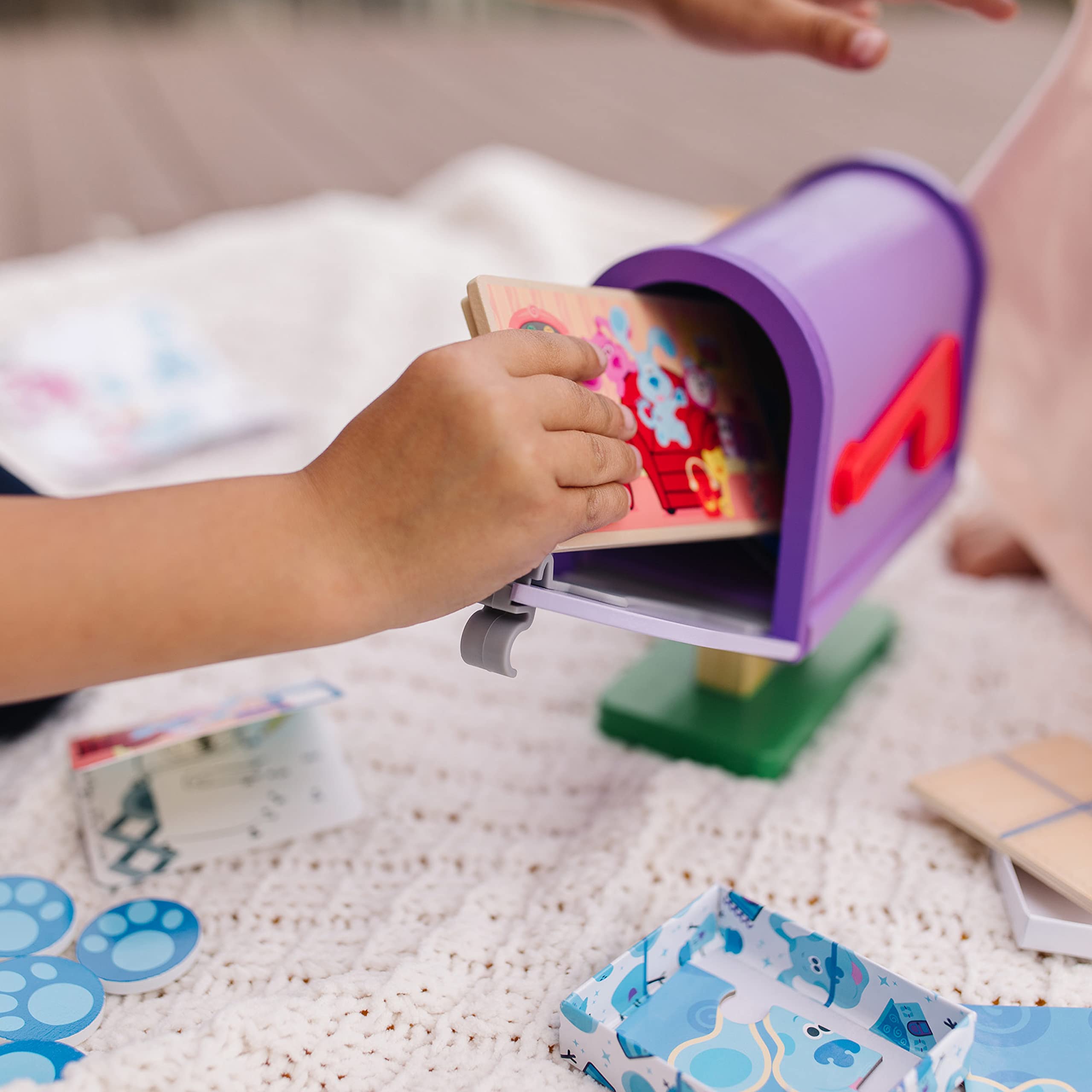 Gift box stores Blue's Clues mailbox pieces neatly for easy cleanup