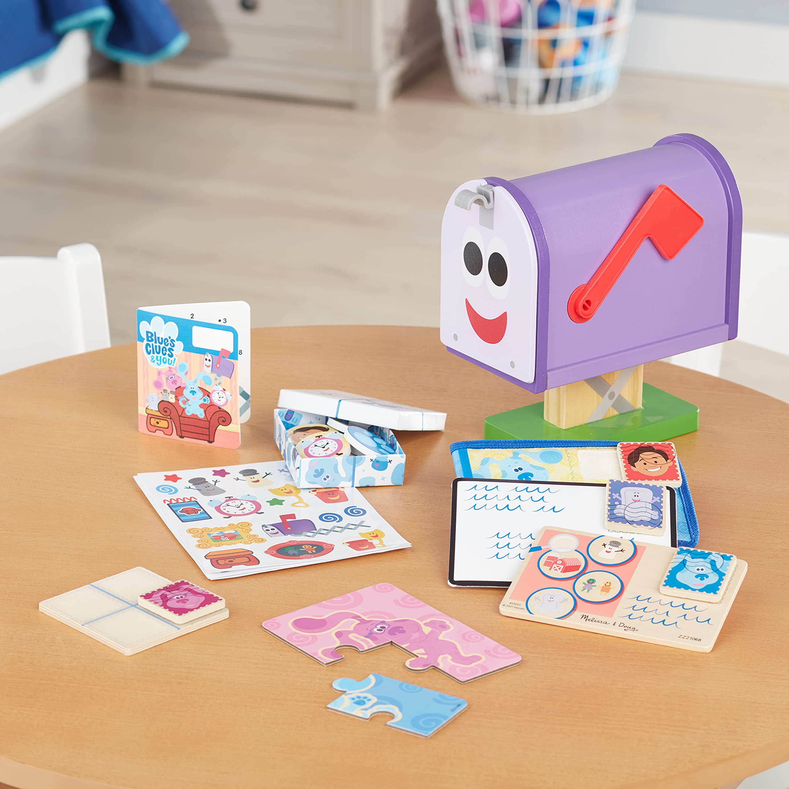 Reusable stickers customize the Blue's Clues mailbox for creative prompts