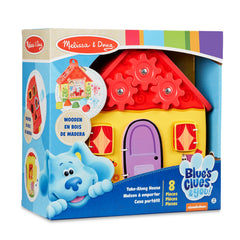 Melissa & Doug bungee-hinged windows and door open for easy access.