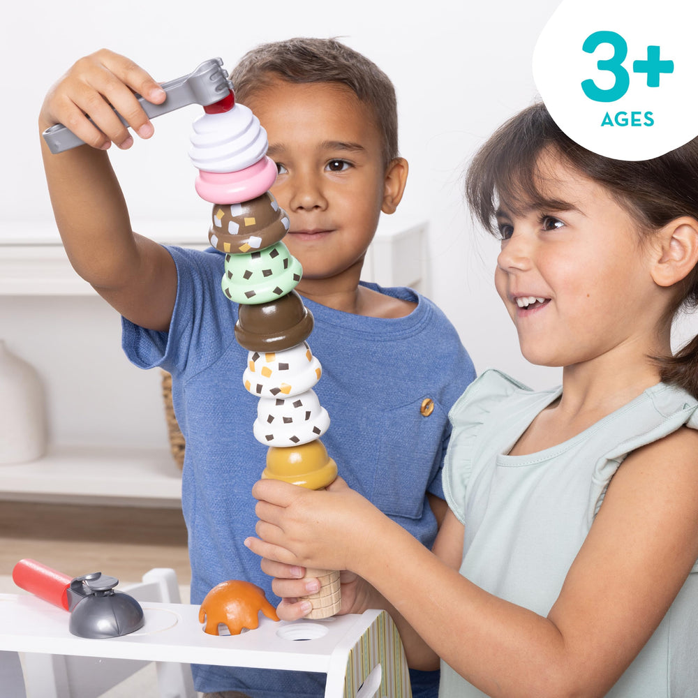 Melissa & Doug child scooping pretend ice cream demonstrating fine-motor practice
