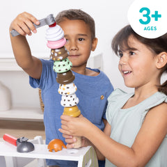 Melissa & Doug child scooping pretend ice cream demonstrating fine-motor practice