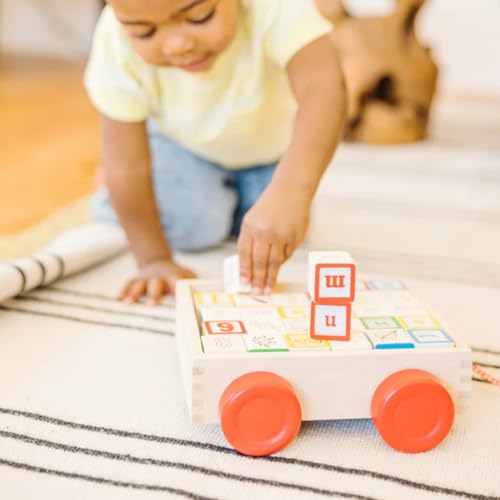 Melissa & Doug Classic ABC Block Cart compact storage enables tidy playtime