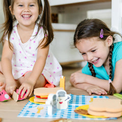 Melissa & Doug cloth picnic basket tote stores all pieces neatly.