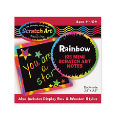 Melissa & Doug Desktop dispenser box keeps Rainbow Mini Notes neatly organized during play.