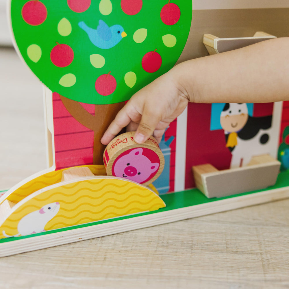 Melissa & Doug GO Tots disks feature six animals and two farmers.