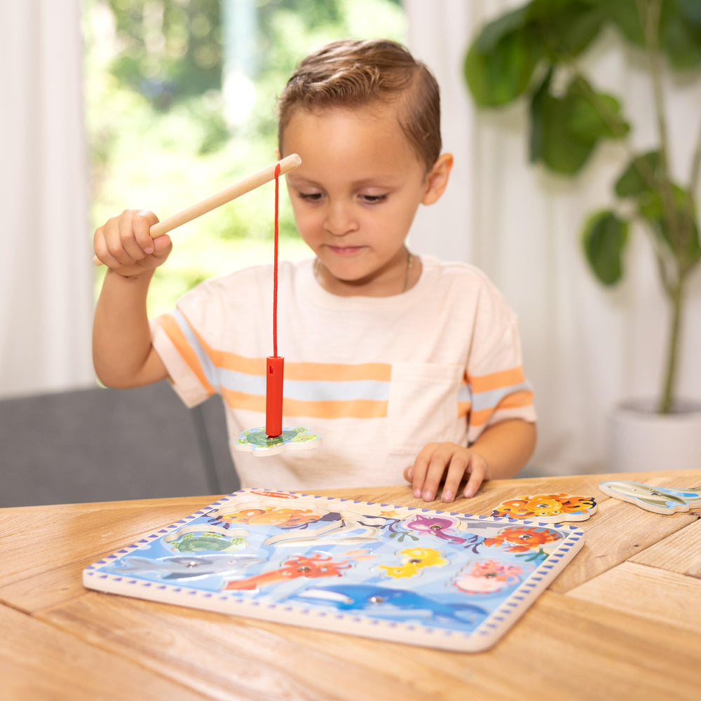 Hand-eye coordination toy by Melissa & Doug in a kid-friendly sea setting.