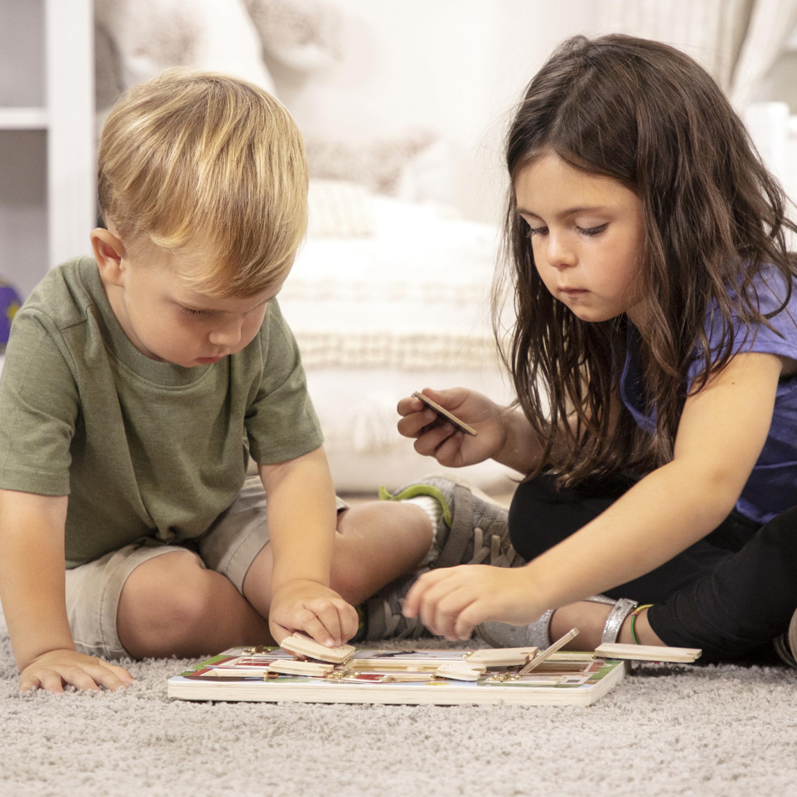 Melissa & Doug Hide and Seek Farm cat magnet enhances storytelling play.
