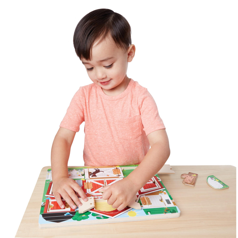 Melissa & Doug Hide and Seek Farm hen magnet adds color to the scene.