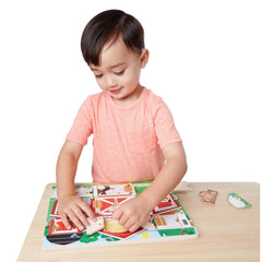 Melissa & Doug Hide and Seek Farm hen magnet adds color to the scene.