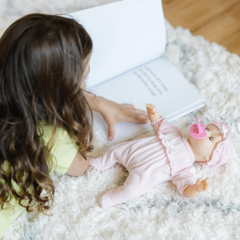 Jenna 12-inch doll with eyes that open and close for nap-time moments.