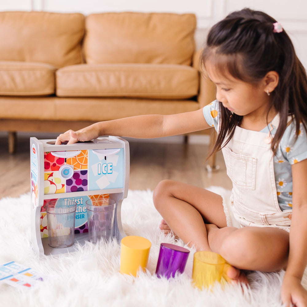 Melissa & Doug juice inserts set enables colorful pretend drinks.