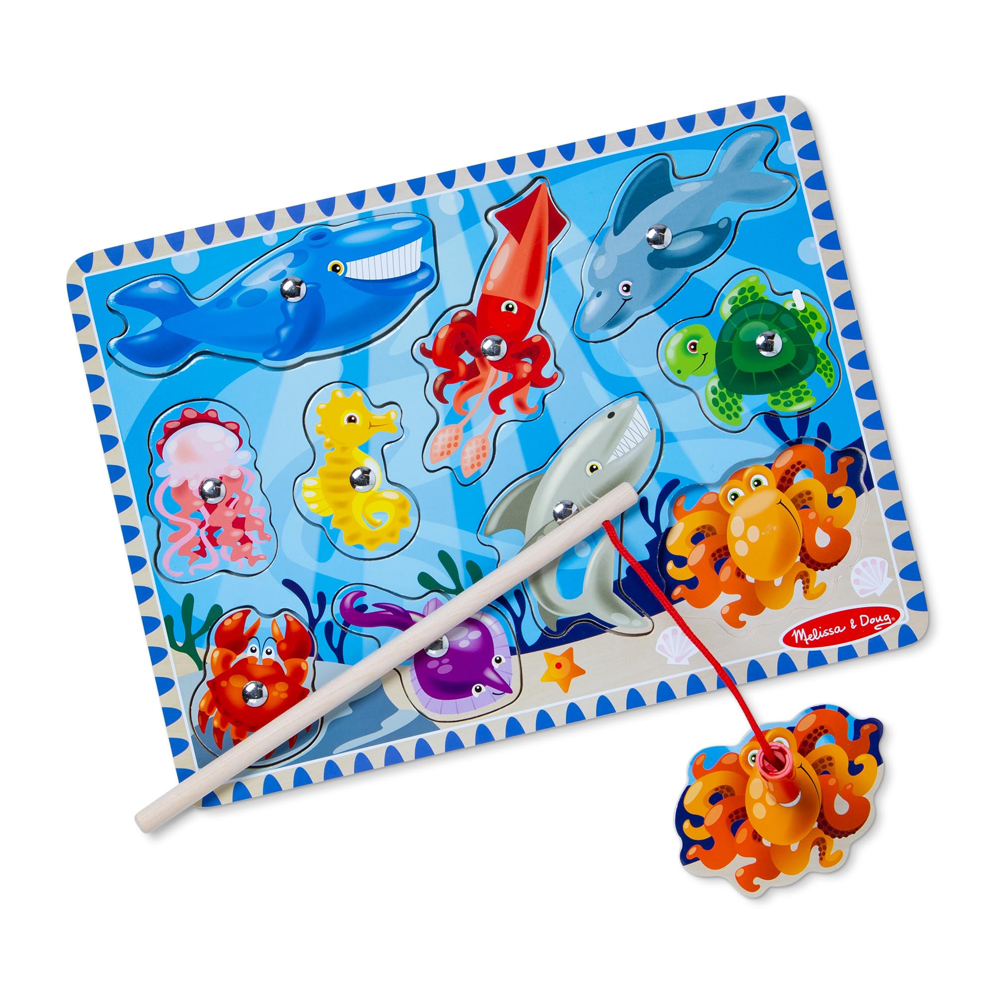 Melissa & Doug magnetic fishing pole catching a bright fish to boost hand-eye coordination.