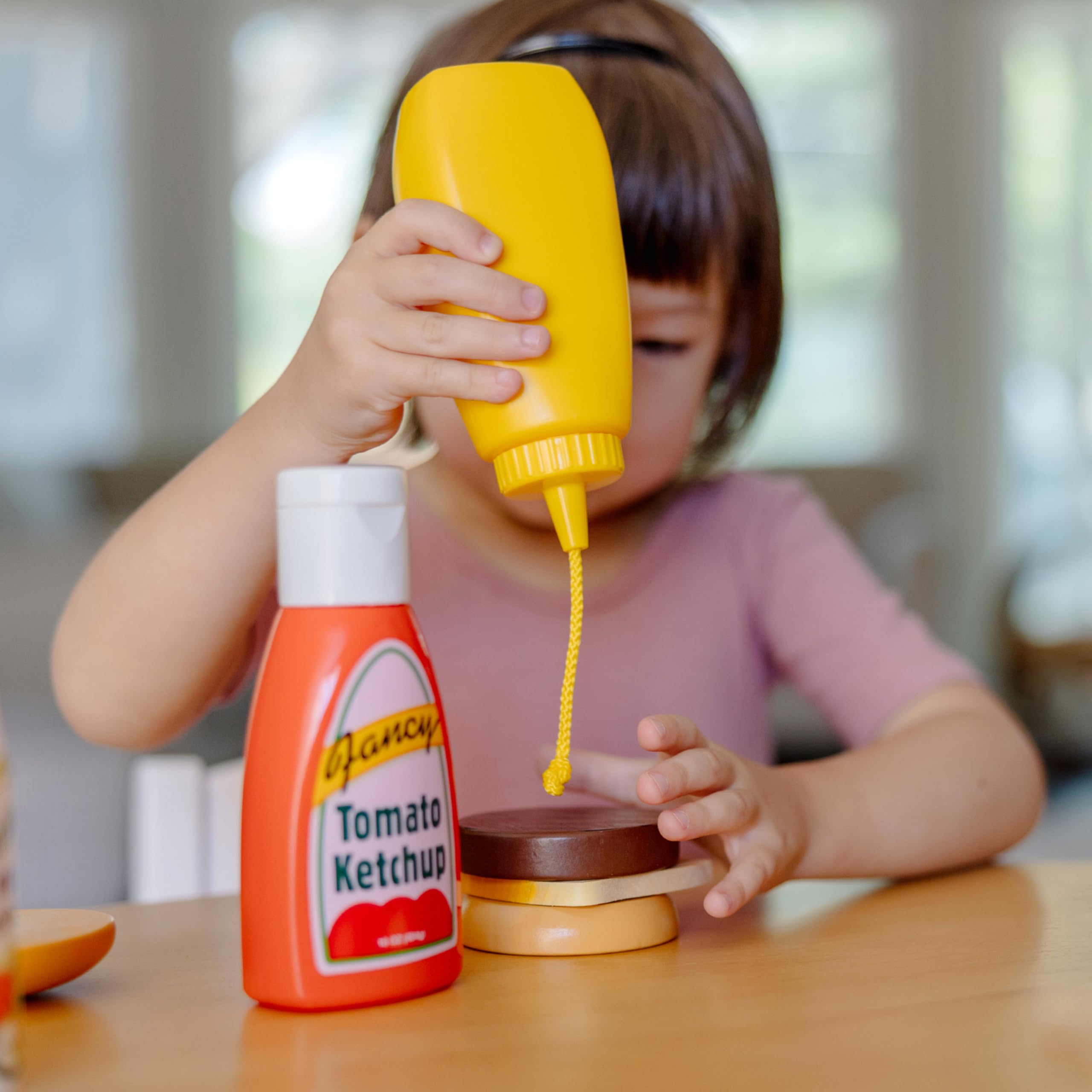 Melissa & Doug mayo and ranch bottle set supports creative sandwich pretend.