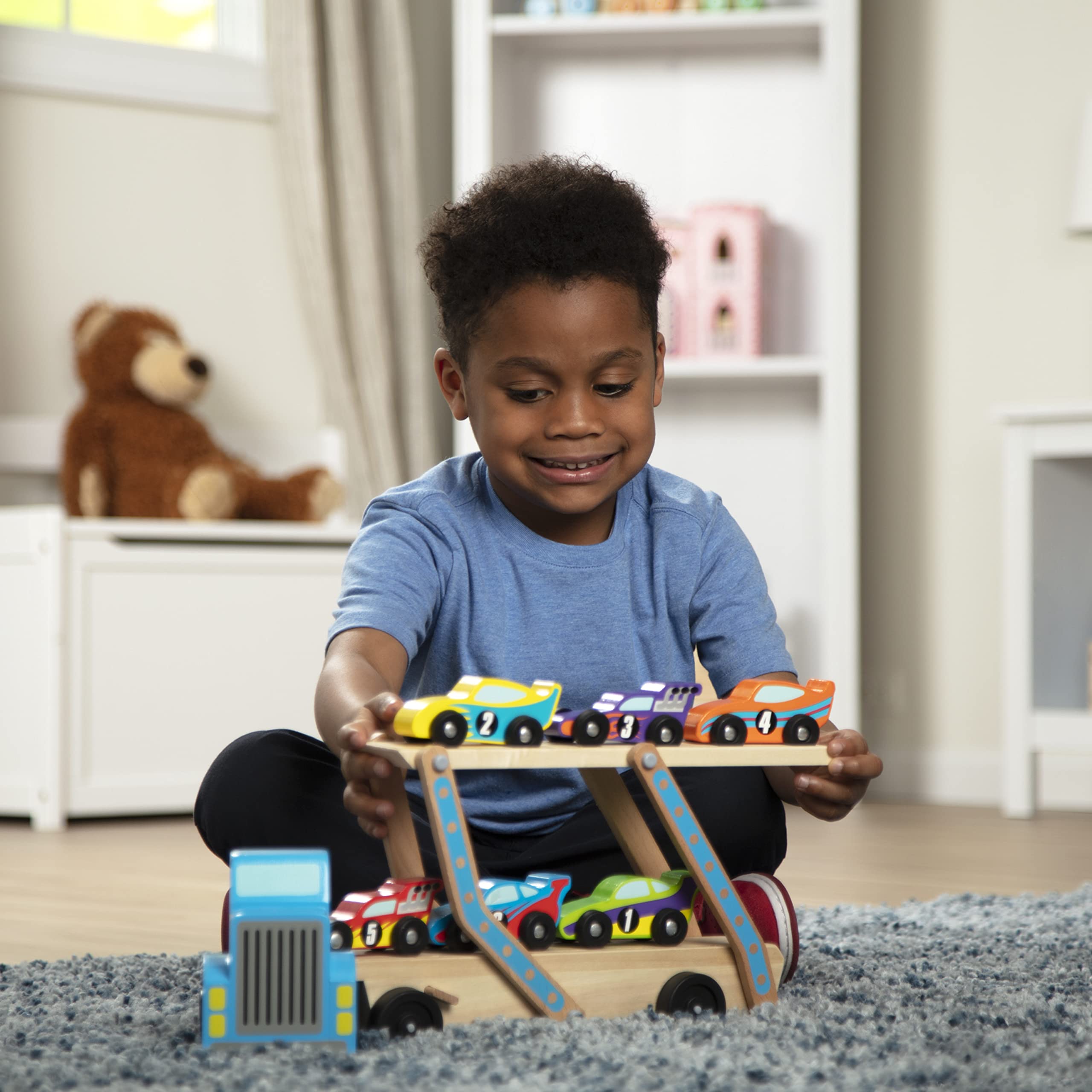 Melissa & Doug Mega Race-Car Carrier ships in curbside recyclable packaging for easy unboxing.
