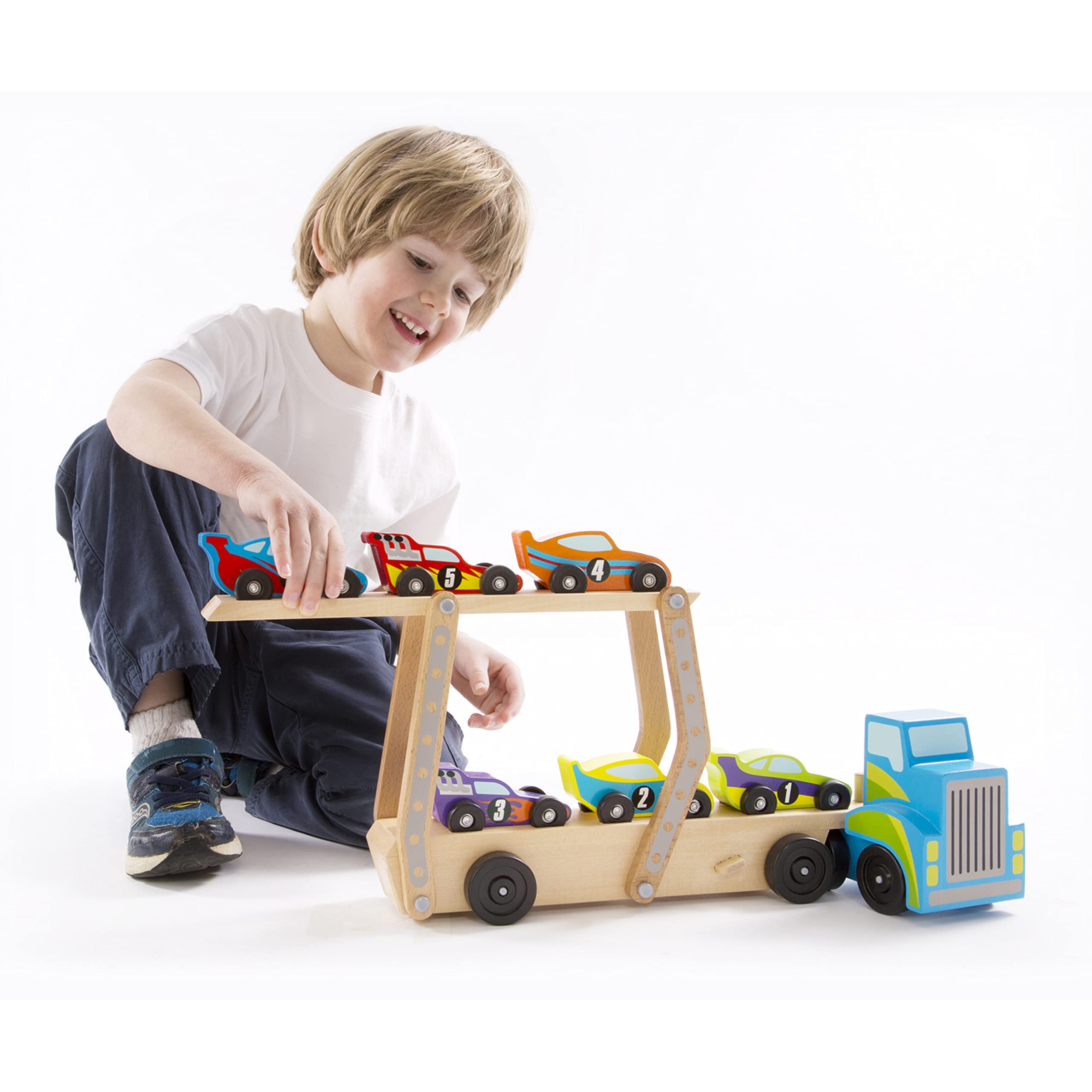 Melissa & Doug Mega Race-Car Carrier includes six numbered cars for counting and color recognition.
