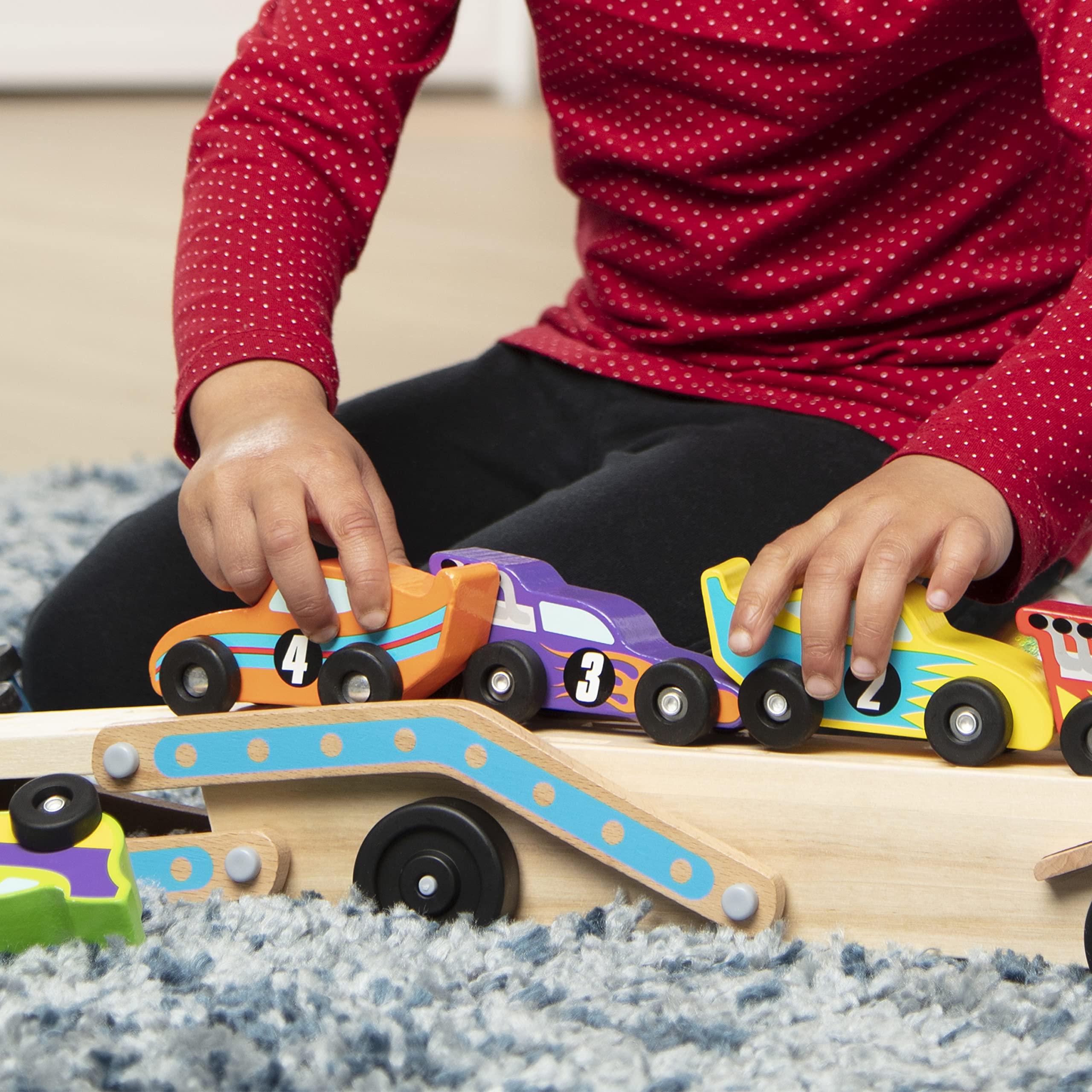 Melissa & Doug Mega Race-Car Carrier makes a great gift for preschool play and imagination.