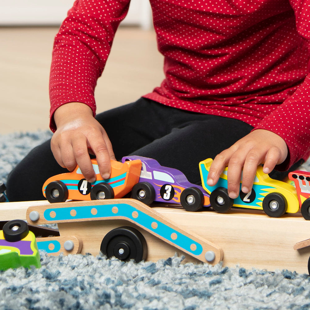Melissa & Doug Mega Race-Car Carrier makes a great gift for preschool play and imagination.