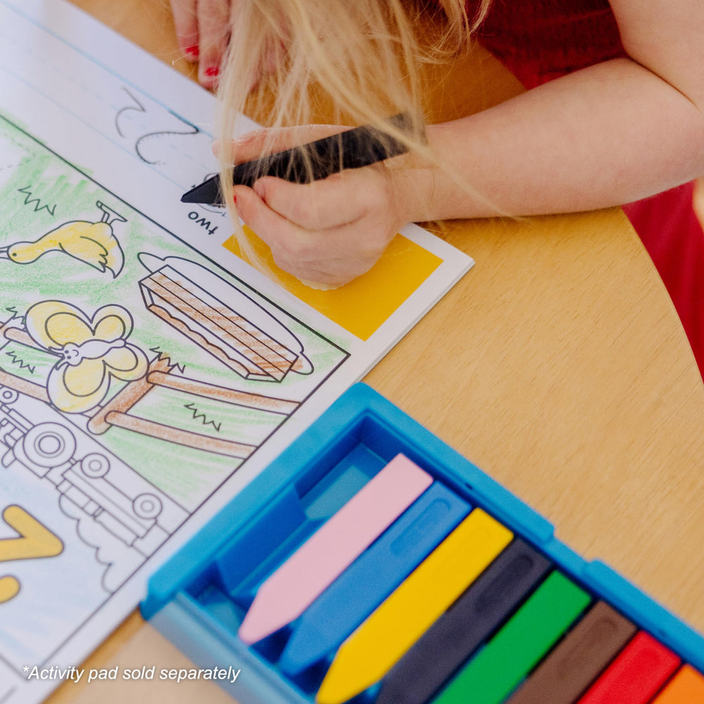 Melissa & Doug triangular grip supports early writing skills in fun activities.