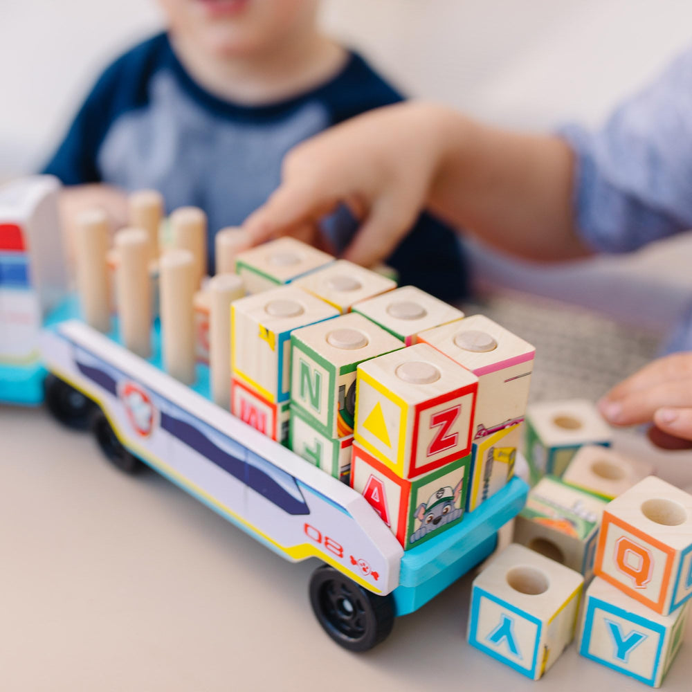 Three wooden figures expand pretend play and role-play scenarios.