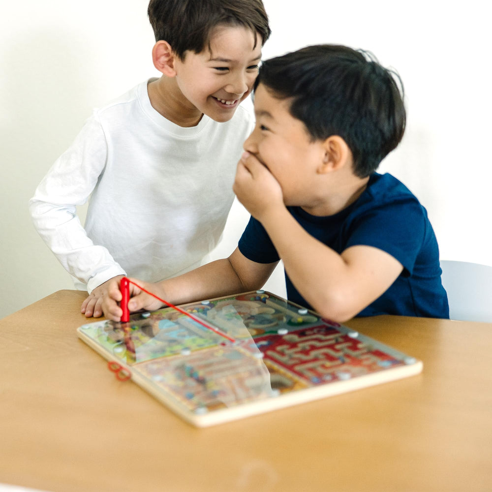 Melissa & Doug Paw Patrol maze board’s see-through cover keeps pieces in place.