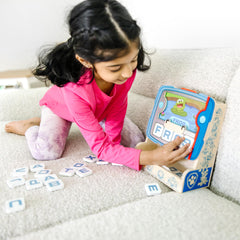 Paw Patrol Pup Pad open showing cards and tiles for hands-on spelling.