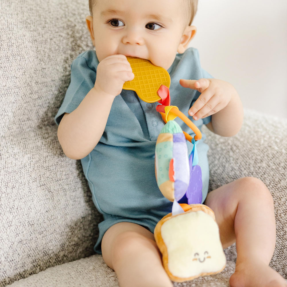 Melissa and Doug PB J clip-on toy multi-textured pieces spark sensory discovery.