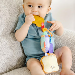 Melissa and Doug PB J clip-on toy multi-textured pieces spark sensory discovery.