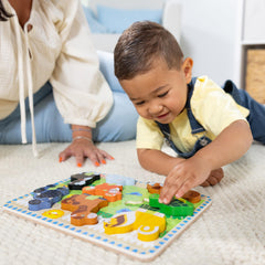 Melissa & Doug Pets wooden chunky puzzle dog piece boosts fine motor skills and imaginative play.