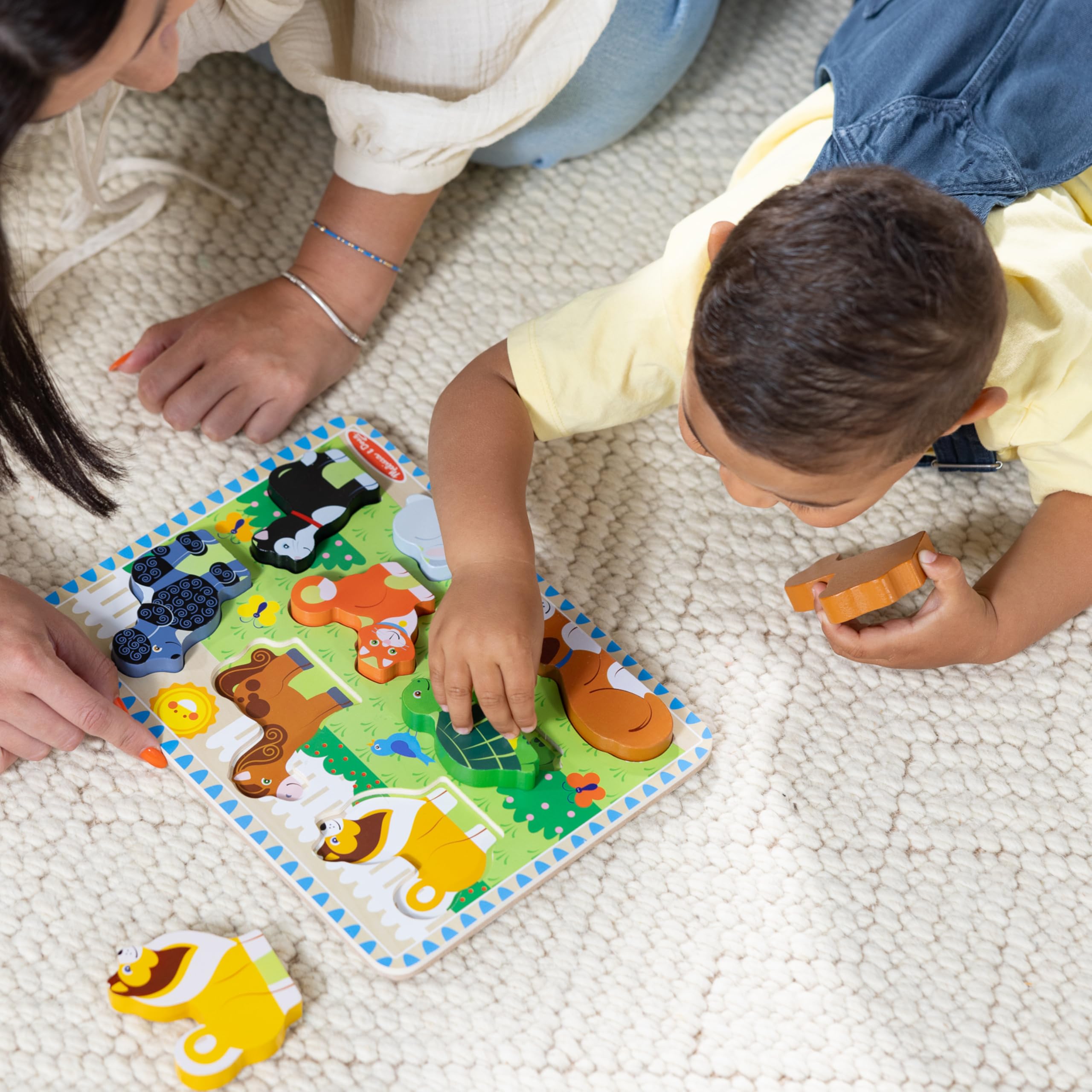 Melissa & Doug Pets wooden chunky puzzle with eight pieces aids early problem solving.