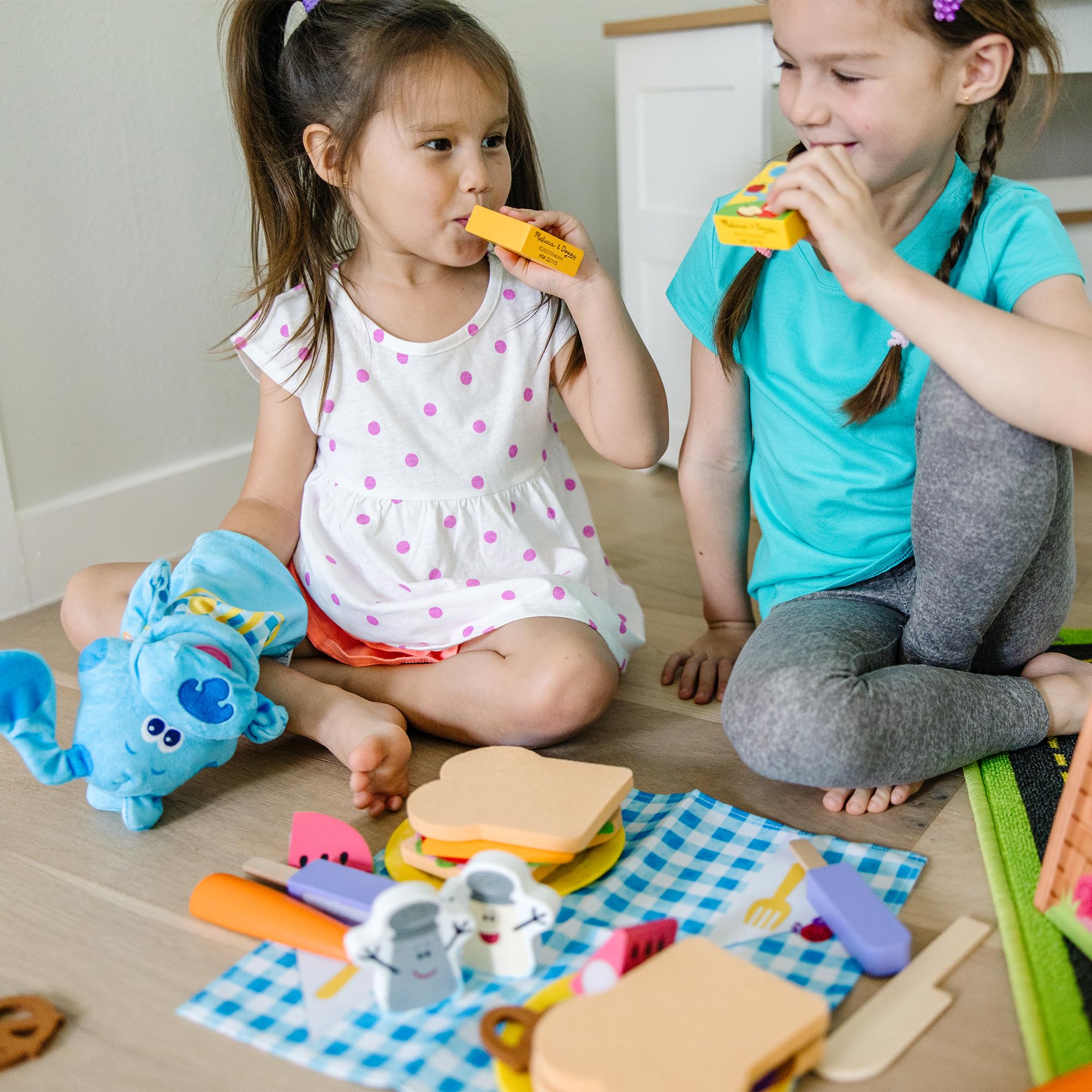 Melissa & Doug play food stack encouraging fine motor skills.