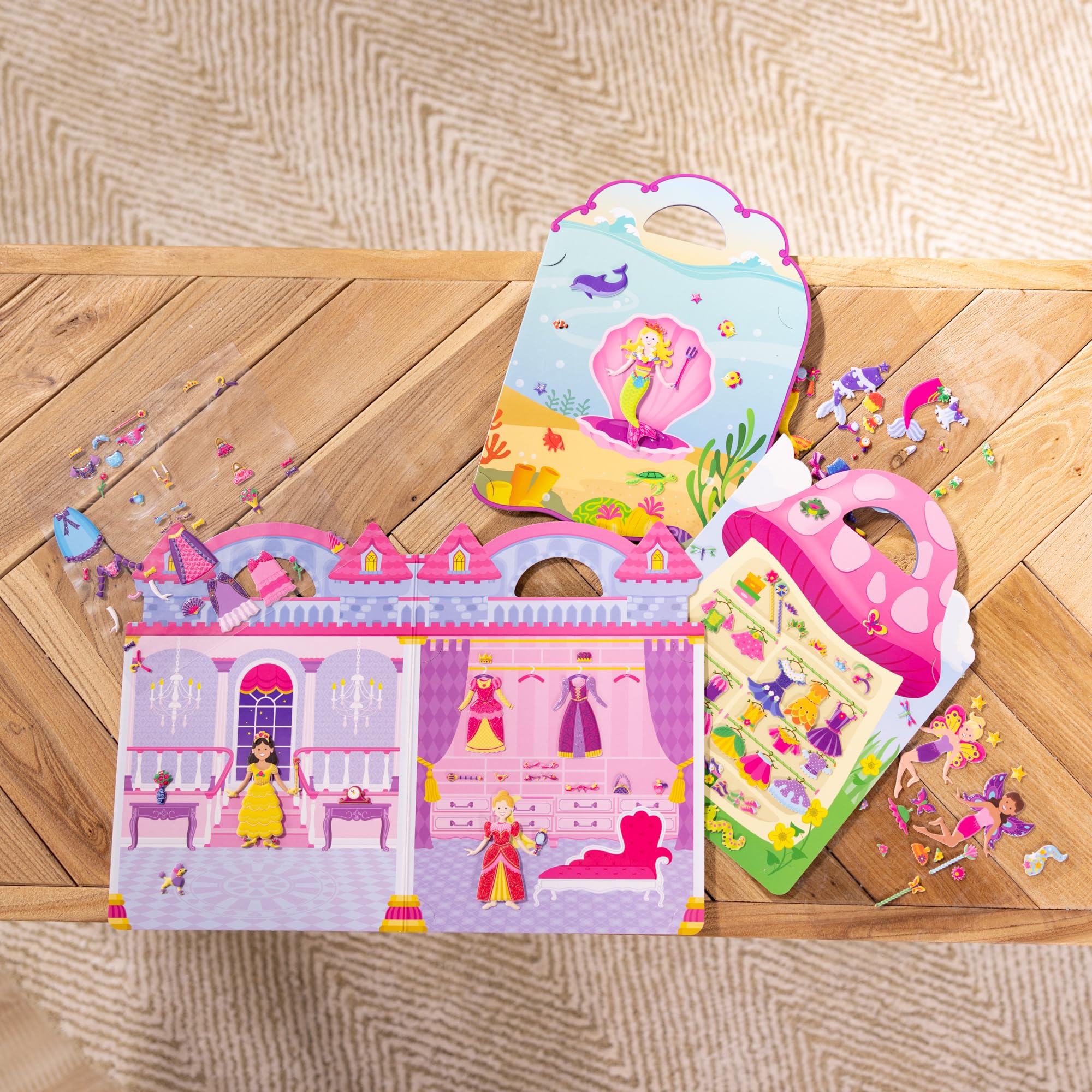 Melissa & Doug Puffy Sticker set close-up shows 65+ restickable pieces ready to reuse.