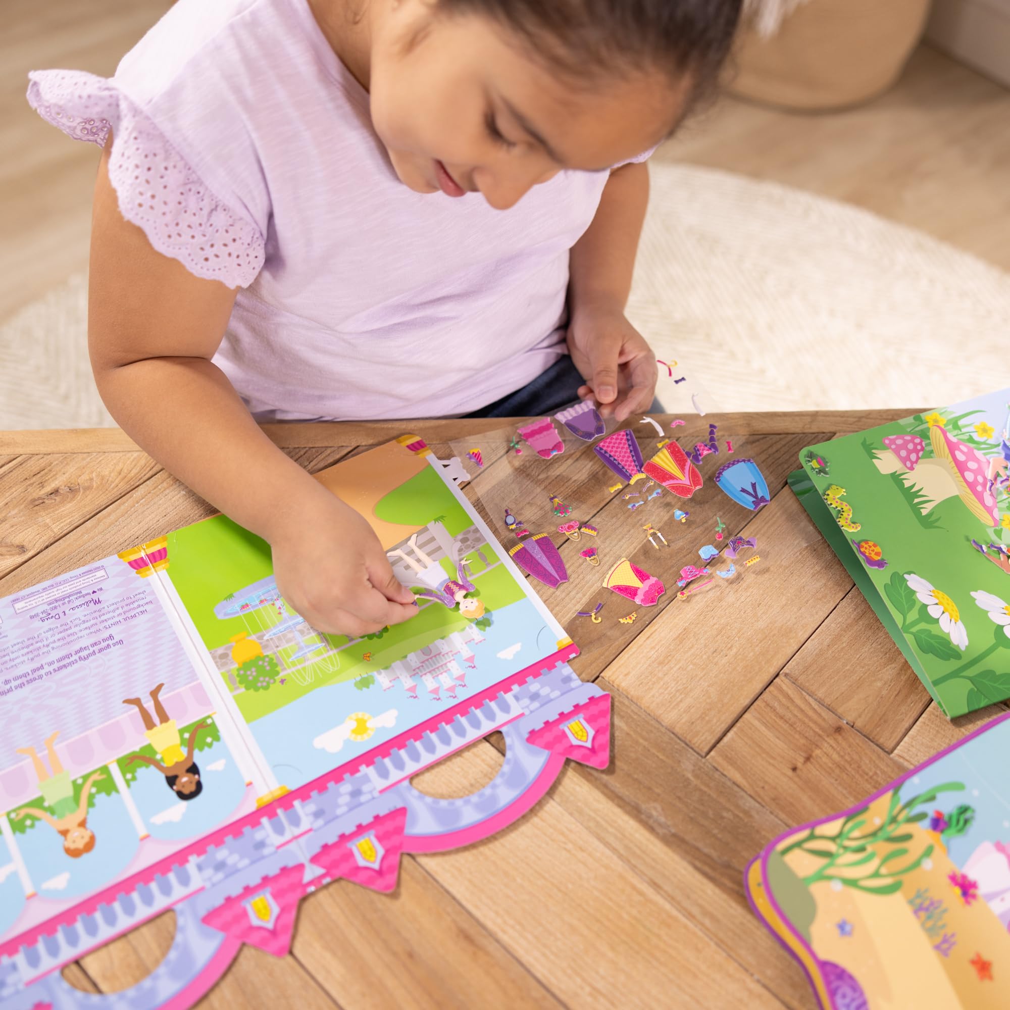 Melissa & Doug Puffy Sticker fold-out background with glossy finish simplifies storage.
