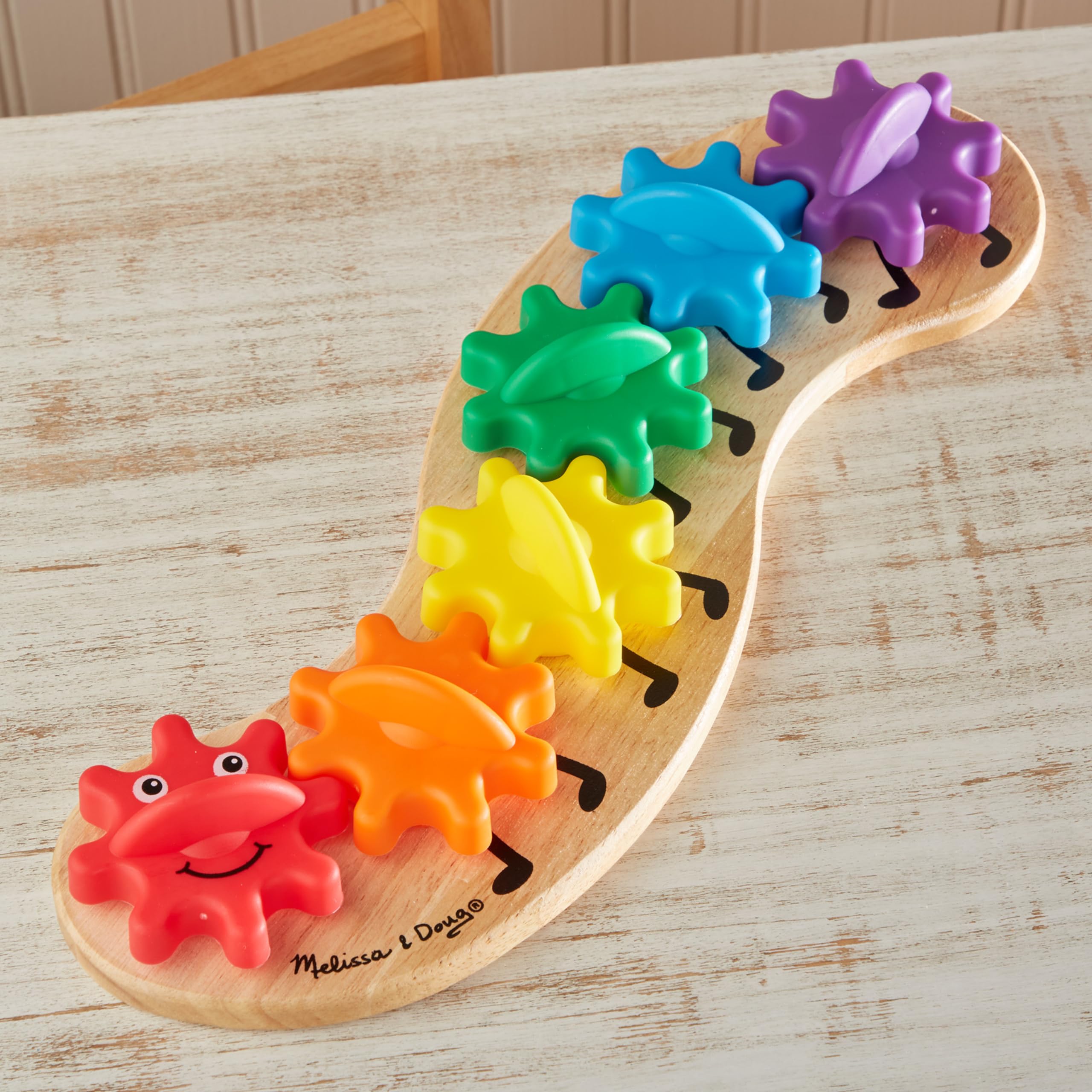 Melissa & Doug Rainbow Caterpillar Gear Toy ideal for screen-free toddler activities.