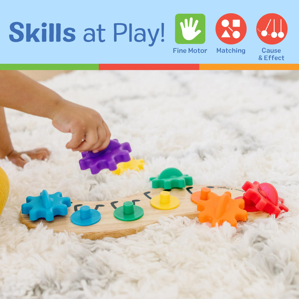 Melissa & Doug Rainbow Caterpillar Gear Toy with rotating gears on a sturdy base.