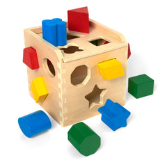 Melissa & Doug Shape Sorting Cube with bright shapes for color and shape recognition.