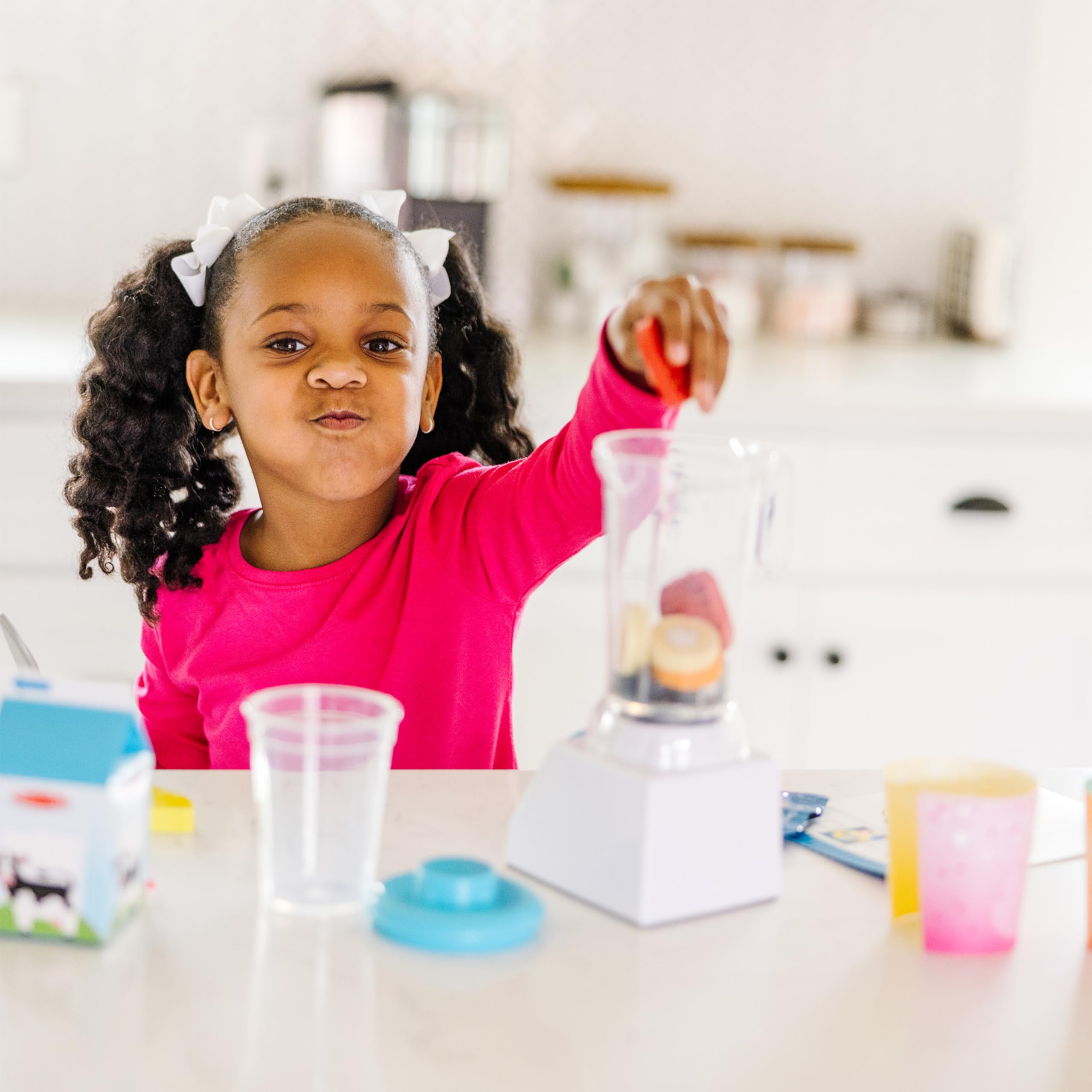 Melissa & Doug Smoothie Maker protein powder for realistic smoothie making and mixing play.