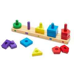 Child uses Stack and Sort Board to improve hand-eye coordination